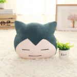 Coussin Pokémon Ronflex avec poches pour les mains